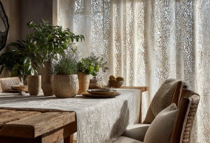 Karshhilit A photograph of an elegant dining table with lace cu 6905f297 e609 4cda 8d04 1a6c2dca0666